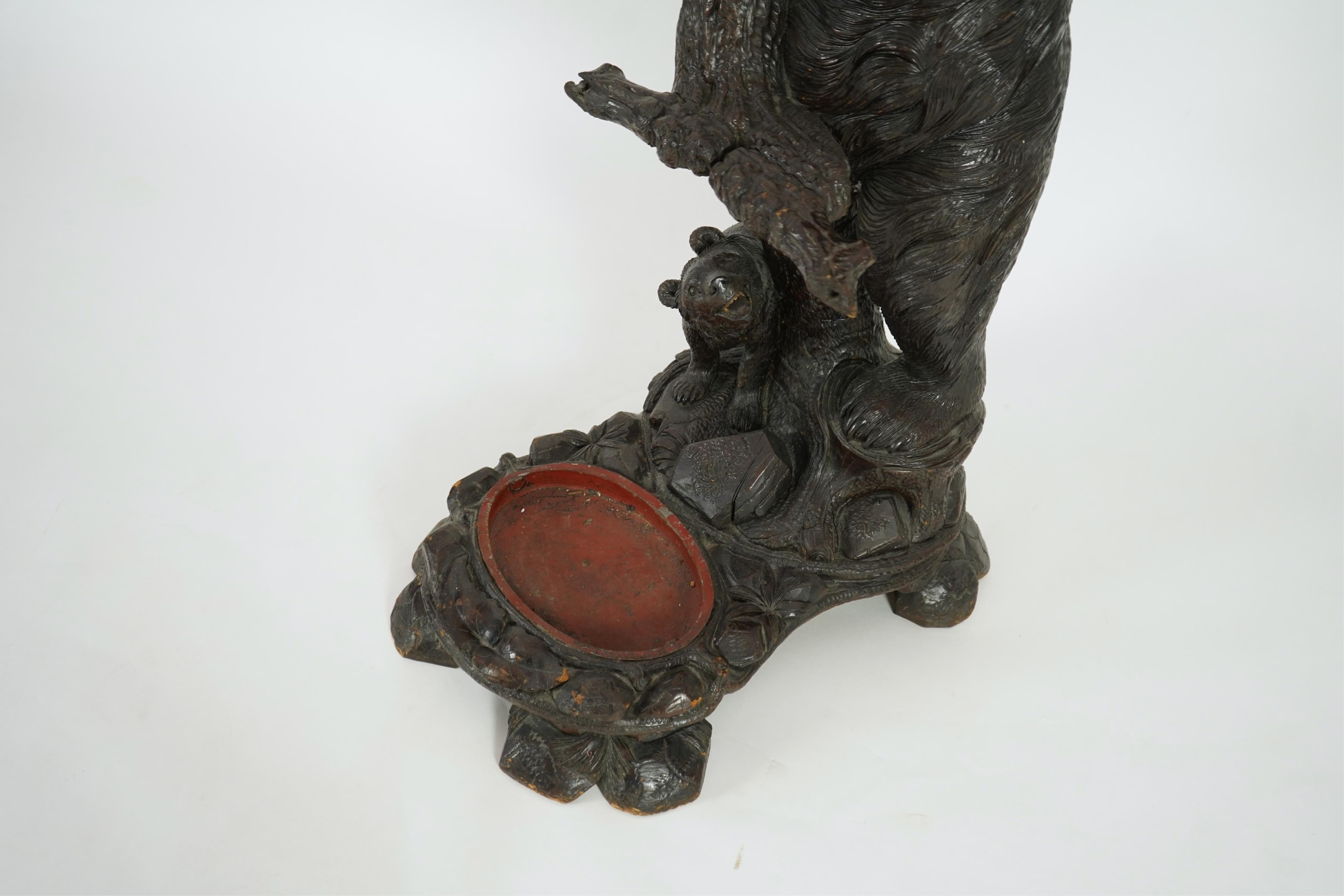 A late 19th century Black forest carved bear hallstand